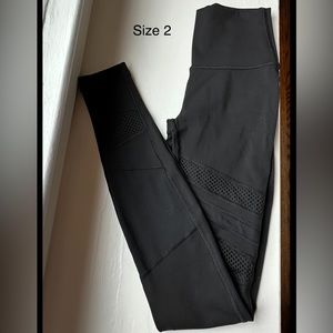 Lululemon leggings with fabric cutouts